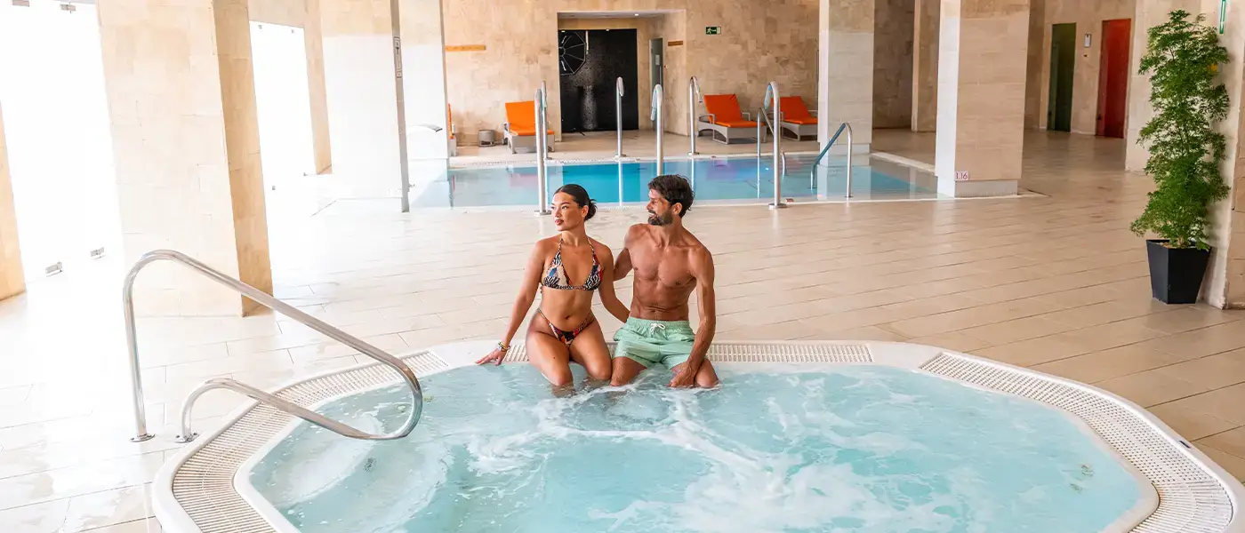 A couple in a swimming pool